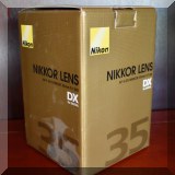E23. Nikkor lens.